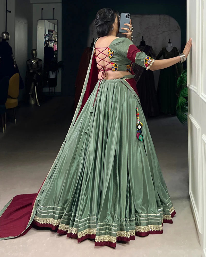 Womenline Graceful Green And Maroon Silk Crape Lehenga Choli With Elegant Dupatta