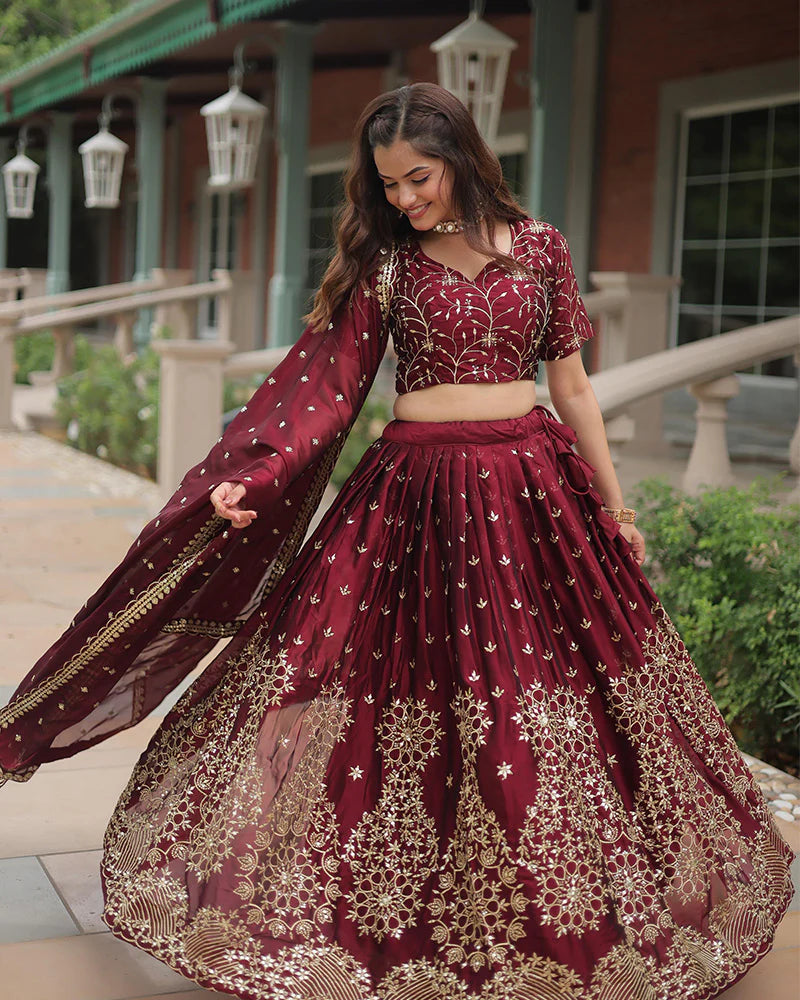 Womenline Maroon Color Rangoli Silk Embroidered Lehenga Choli