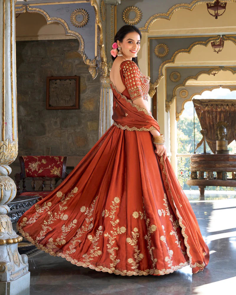 Womenline Rust Orange Color Rangoli Silk Embroidered Lehenga Choli