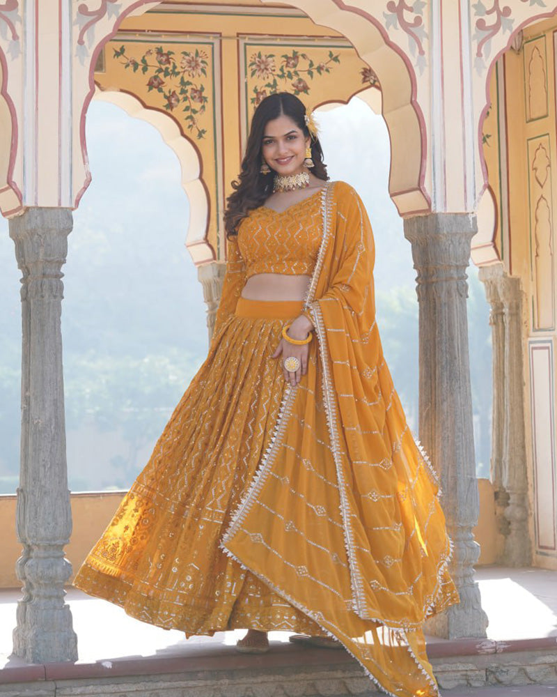 Womenline Yellow Color Georgette Heavy Embroidery Threaded Semi Stitched Lehenga Choli