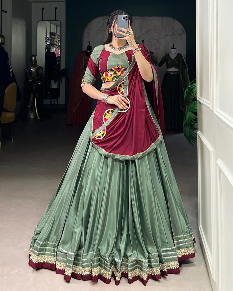 Womenline Graceful Green And Maroon Silk Crape Lehenga Choli With Elegant Dupatta