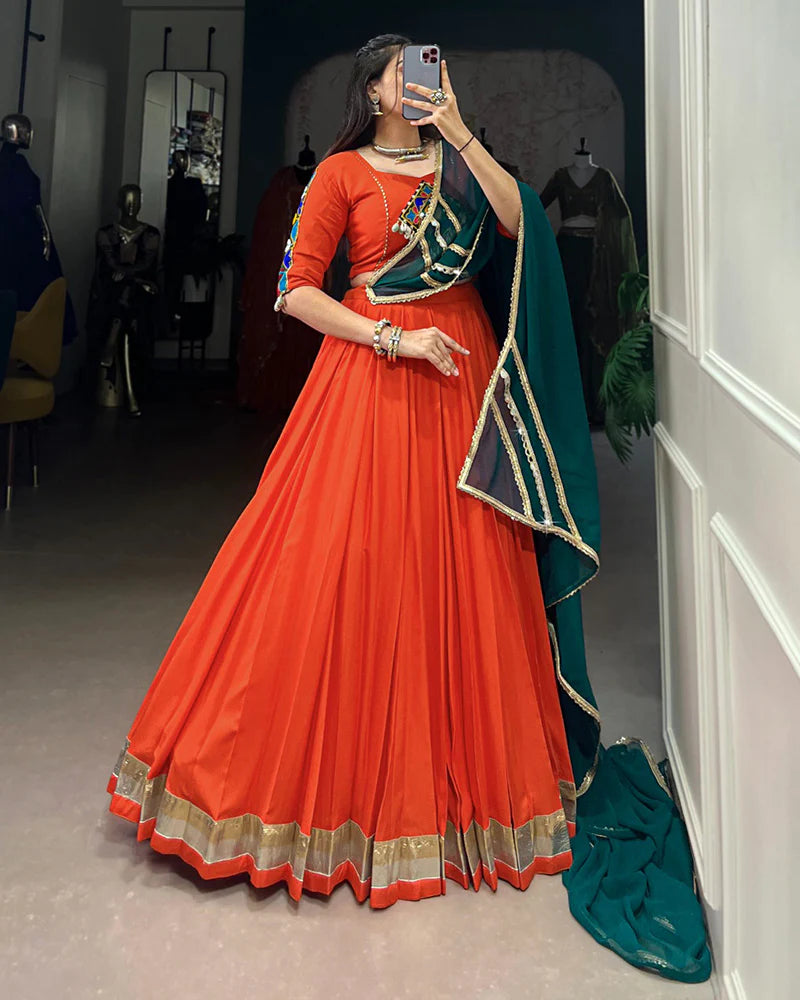 Womenline Orange Color Rayon Embossed Navratri Lehenga Choli