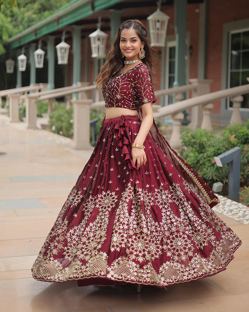 Womenline Maroon Color Rangoli Silk Embroidered Lehenga Choli