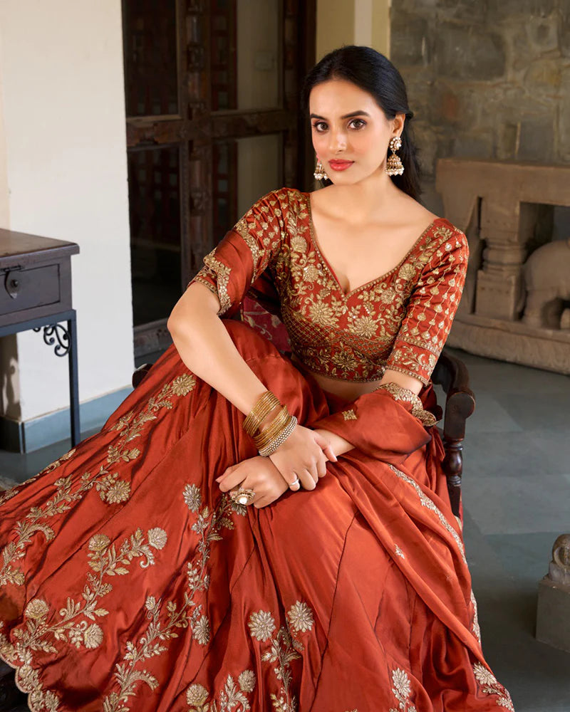 Womenline Rust Orange Color Rangoli Silk Embroidered Lehenga Choli