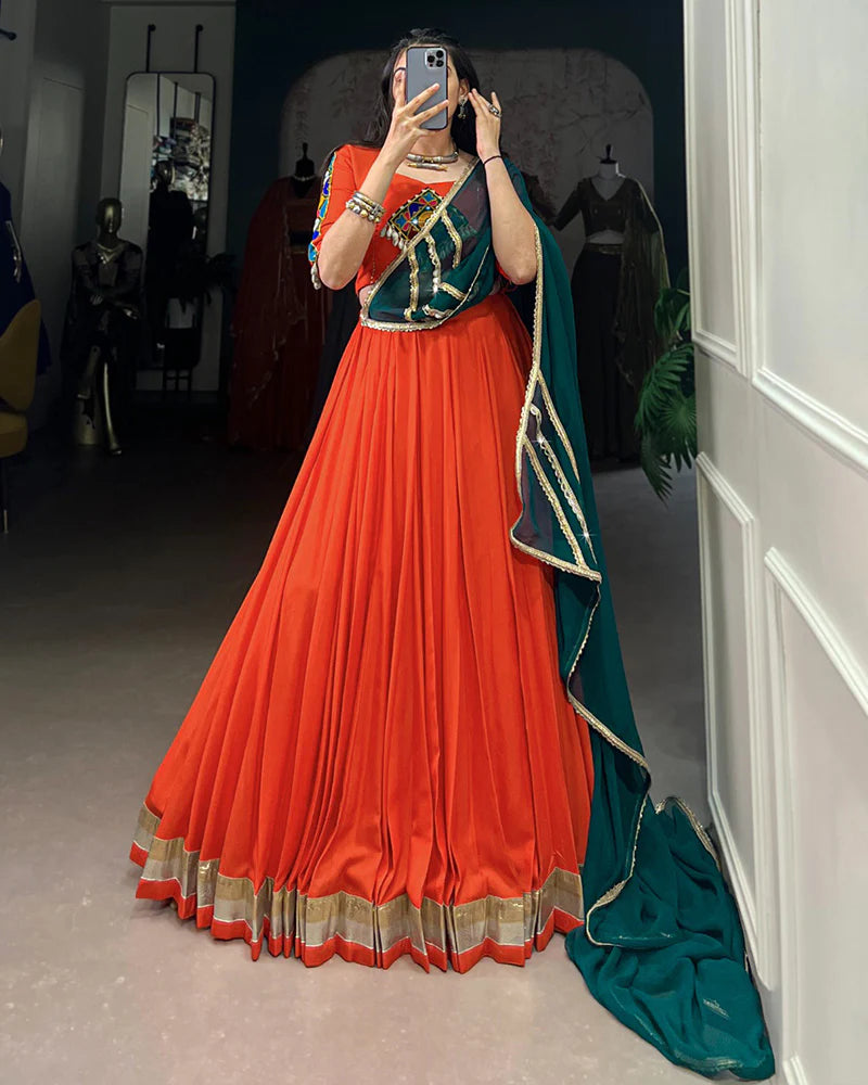 Womenline Orange Color Rayon Embossed Navratri Lehenga Choli