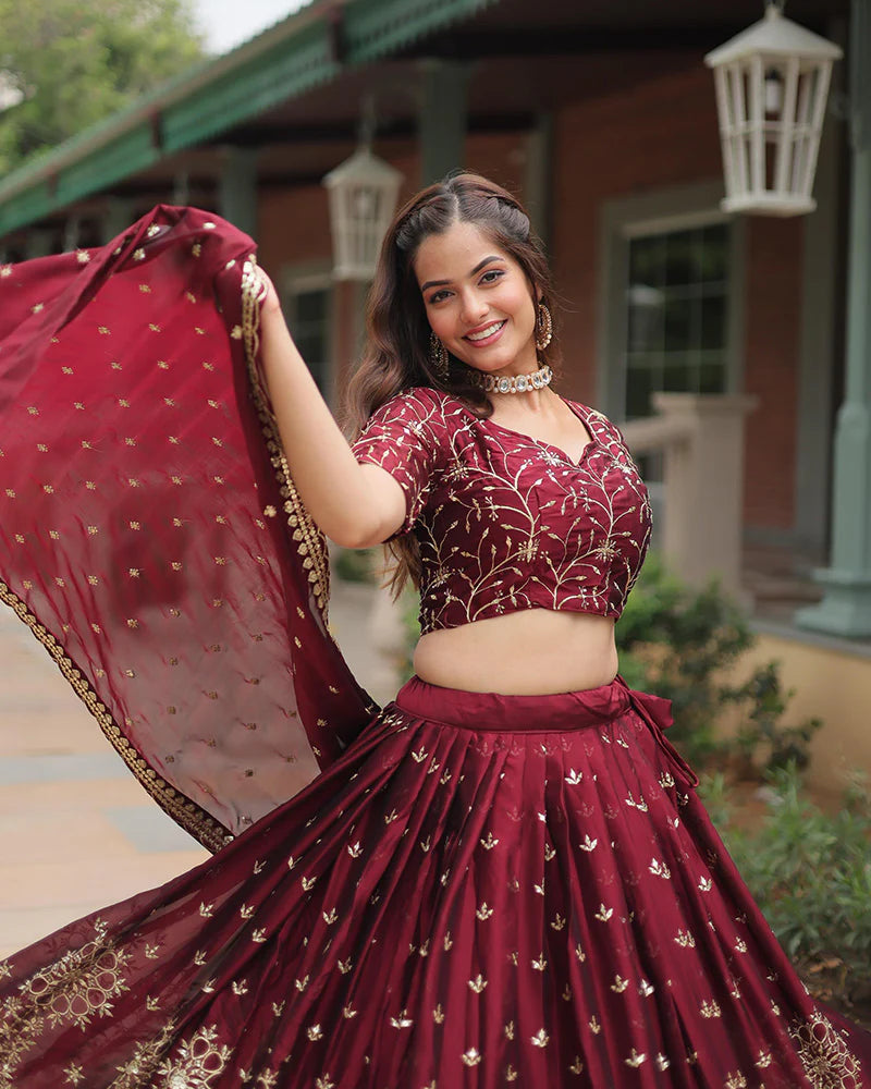 Womenline Maroon Color Rangoli Silk Embroidered Lehenga Choli