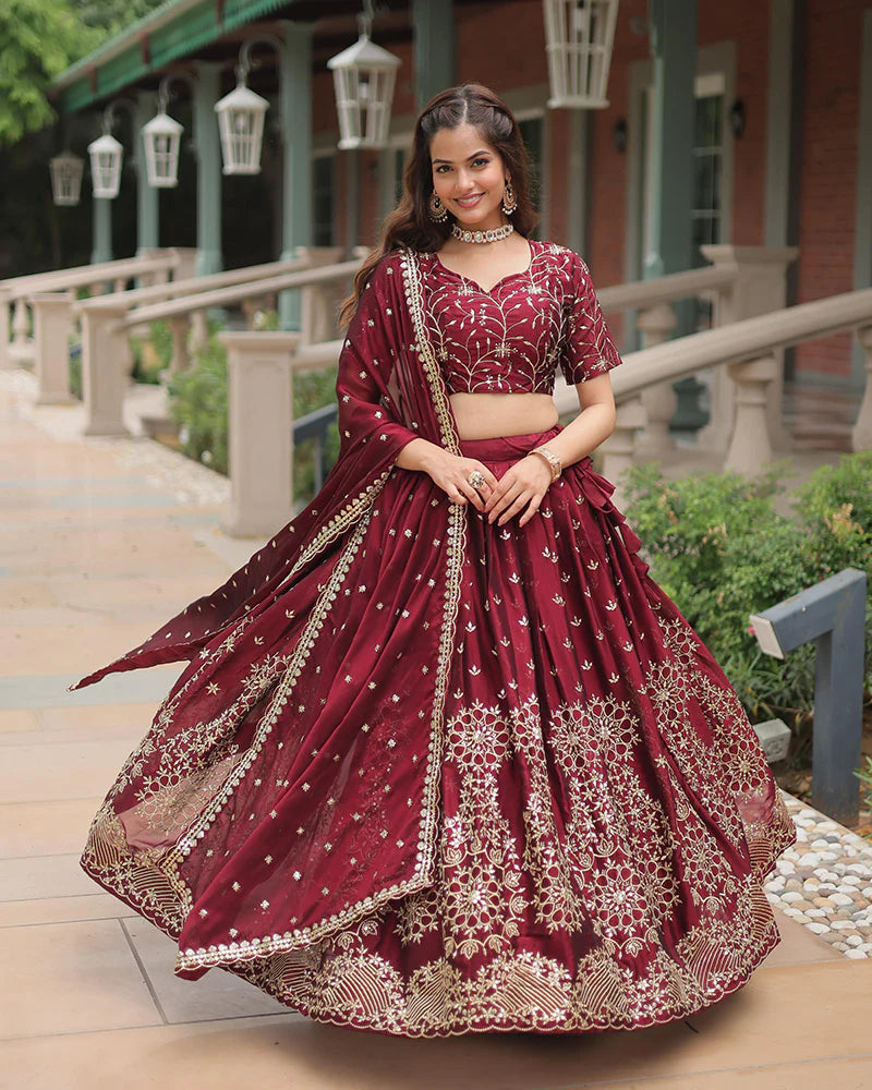 Womenline Maroon Color Rangoli Silk Embroidered Lehenga Choli