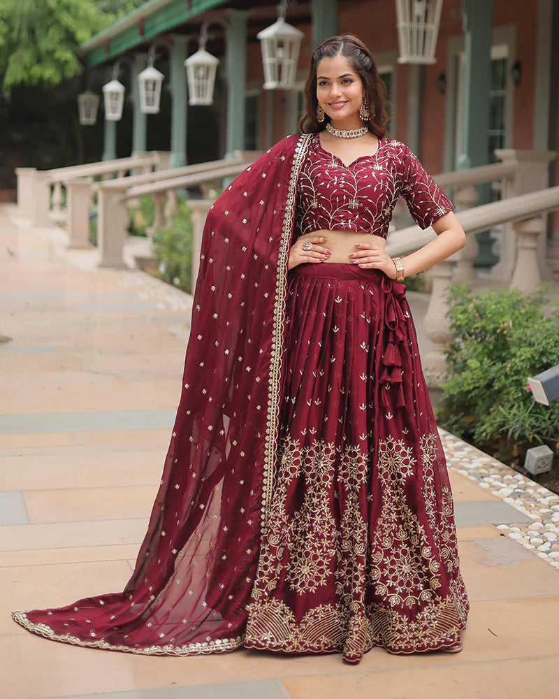 Womenline Maroon Color Rangoli Silk Embroidered Lehenga Choli