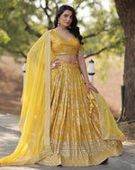 Womenline Yellow Color Pure Viscose Jacquard Lehenga Choli
