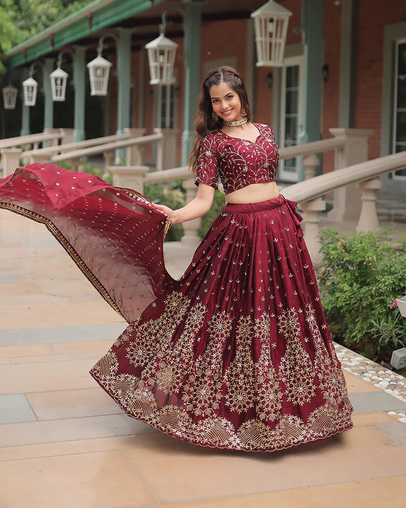 Womenline Maroon Color Rangoli Silk Embroidered Lehenga Choli