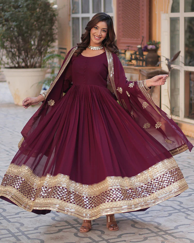 Womenline Royal Maroon Color Faux Blooming Zari Embroidered Work Gown