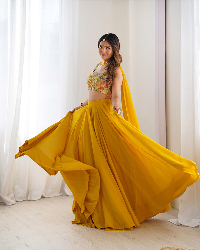 Womenline Yellow Color Pure Soft Georgette Lehenga Choli