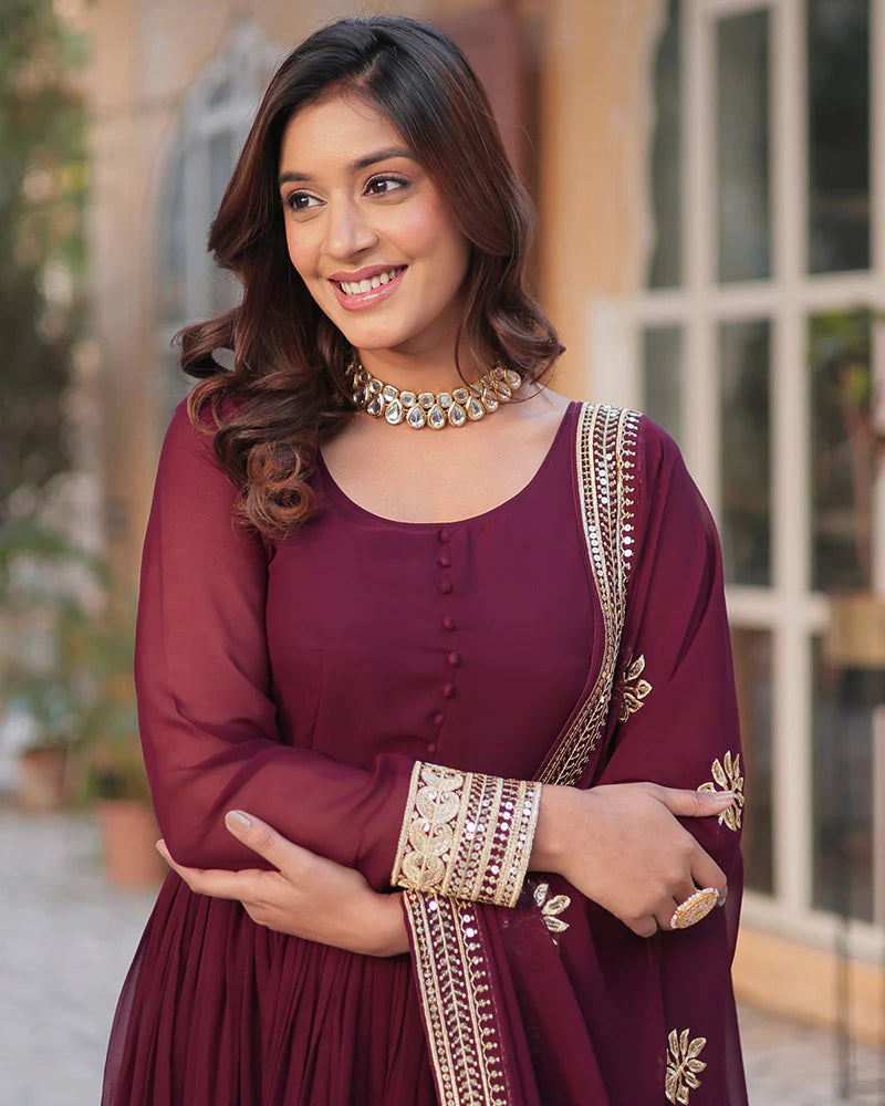 Womenline Royal Maroon Color Faux Blooming Zari Embroidered Work Gown