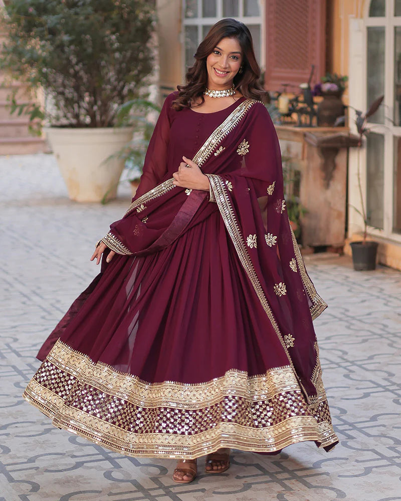 Womenline Royal Maroon Color Faux Blooming Zari Embroidered Work Gown