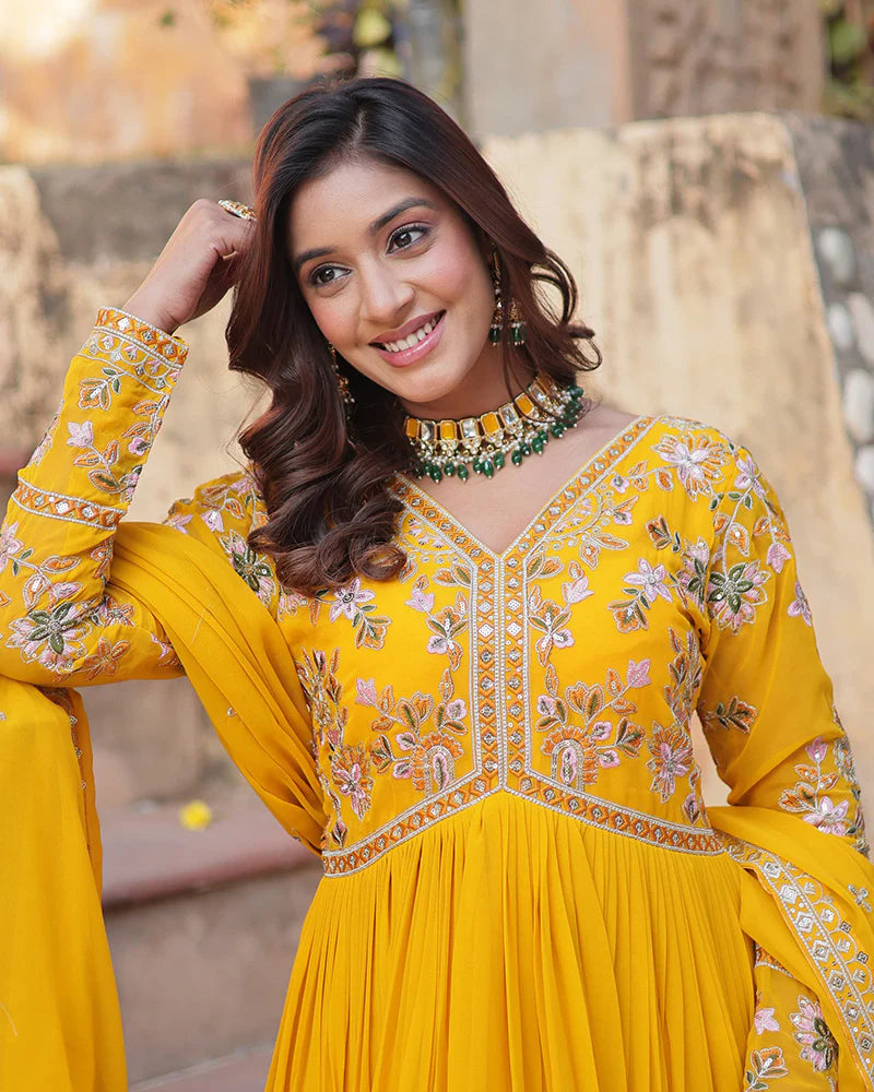 Womenline Mustard Color Faux Blooming Zari Embroidered Work Gown