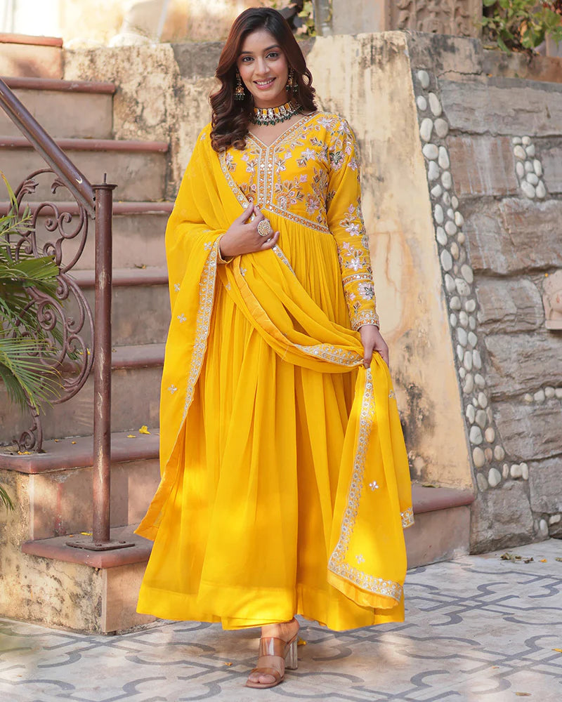 Womenline Mustard Color Faux Blooming Zari Embroidered Work Gown