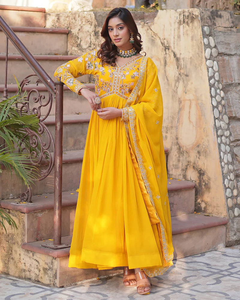 Womenline Mustard Color Faux Blooming Zari Embroidered Work Gown