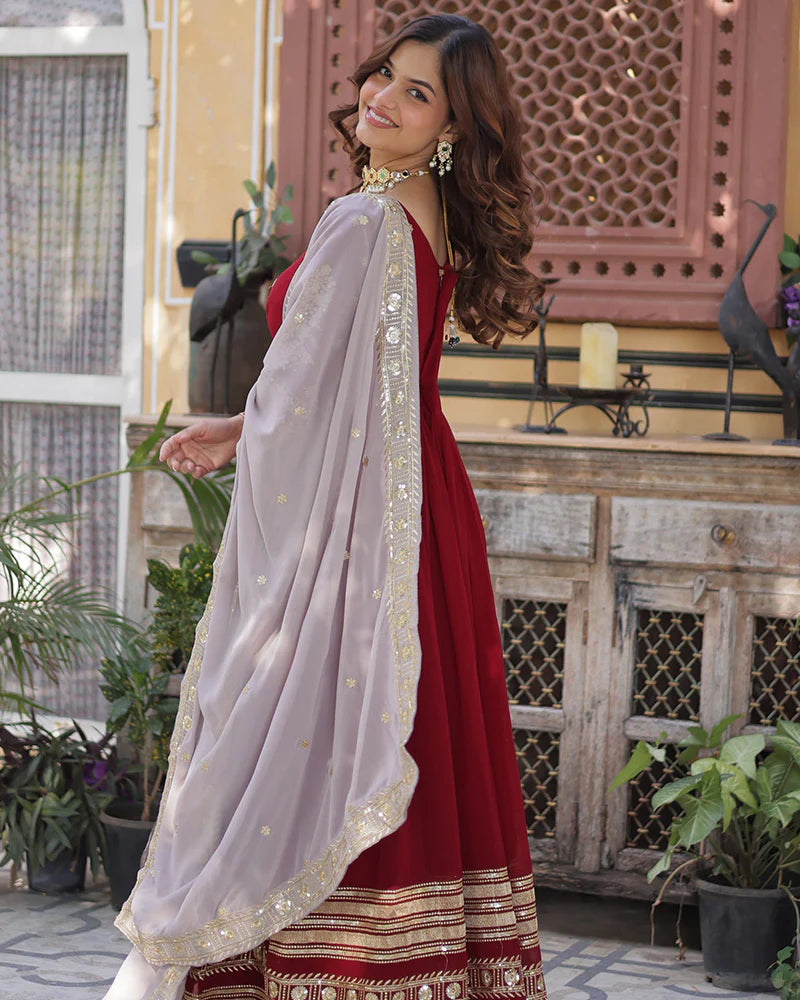 Womenline Rusty Red Color Faux Blooming Zari Embroidered Work Gown