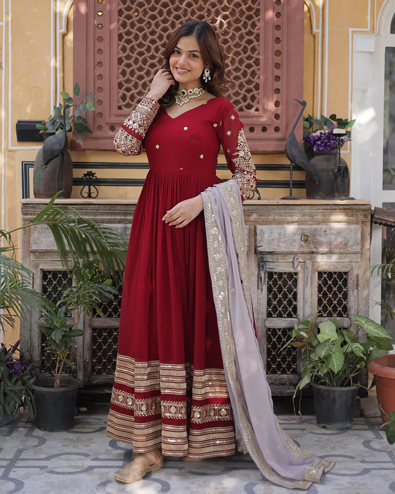 Womenline Rusty Red Color Faux Blooming Zari Embroidered Work Gown