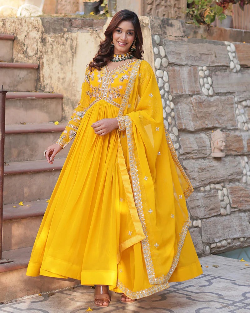 Womenline Mustard Color Faux Blooming Zari Embroidered Work Gown