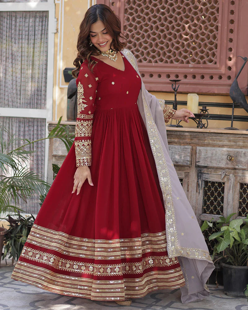 Womenline Rusty Red Color Faux Blooming Zari Embroidered Work Gown