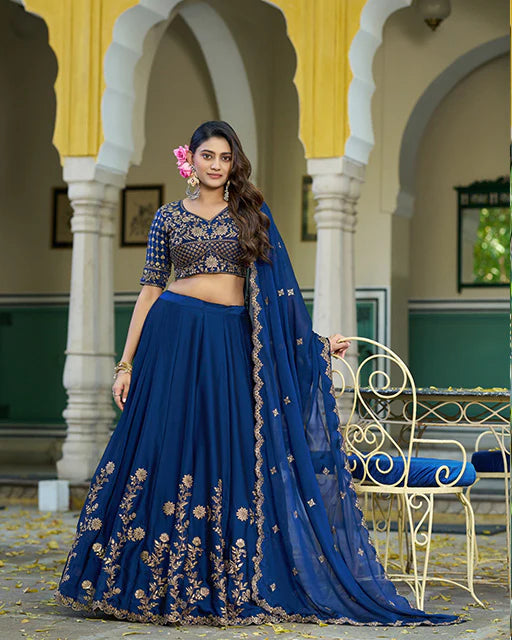 Womenline Royal Blue Color Rangoli Silk Embroidered Lehenga Choli