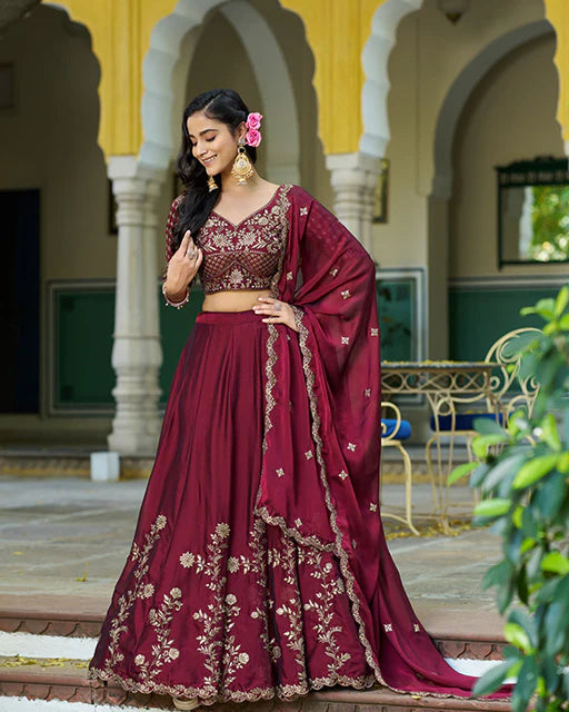 Womenline Dark Maroon Color Rangoli Silk Embroidered Lehenga Choli