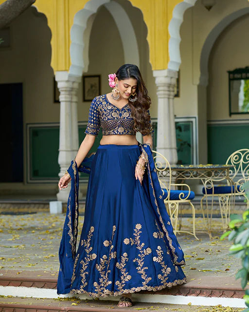 Womenline Royal Blue Color Rangoli Silk Embroidered Lehenga Choli
