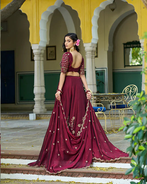 Womenline Dark Maroon Color Rangoli Silk Embroidered Lehenga Choli