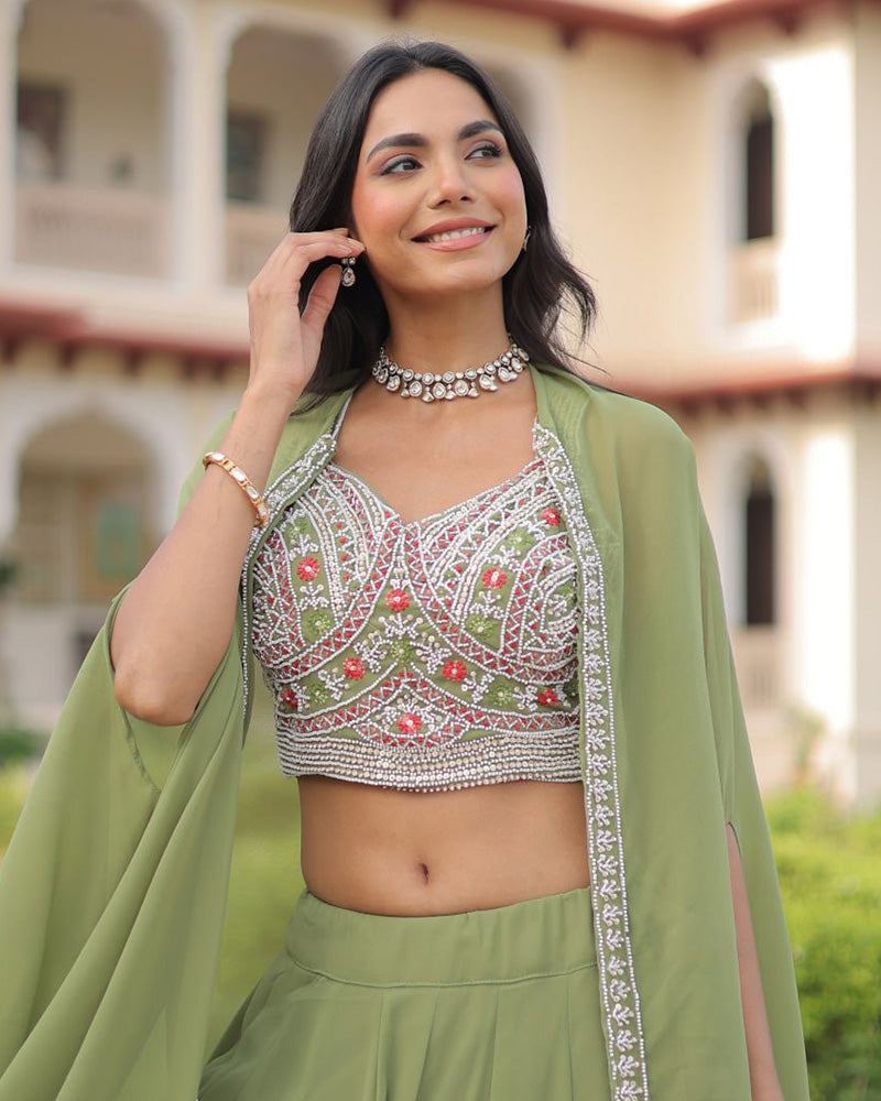 Womenline Pista Color Faux Georgette Embroidered Lehenga Choli