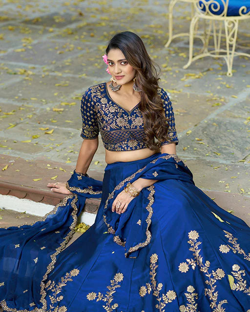 Womenline Royal Blue Color Rangoli Silk Embroidered Lehenga Choli