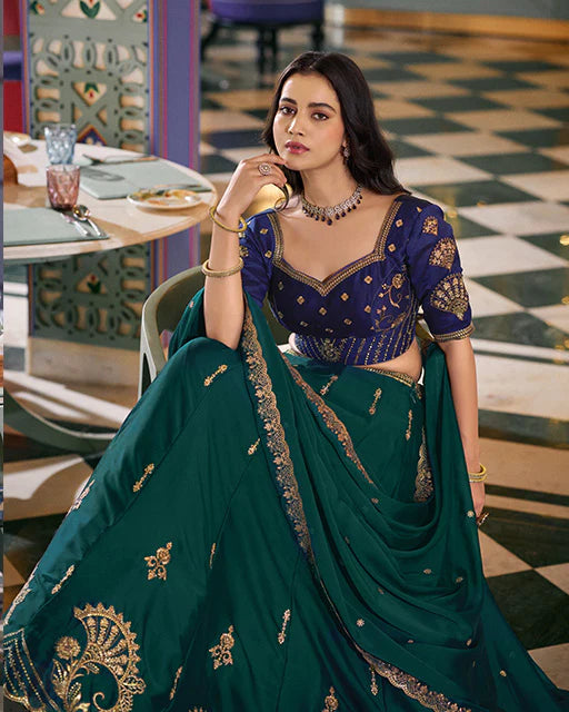 Womenline Parrot Green Color Rangoli Silk Embroidered Lehenga Choli