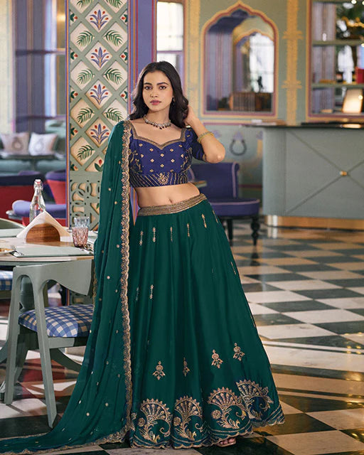 Womenline Parrot Green Color Rangoli Silk Embroidered Lehenga Choli
