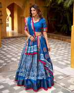 Womenline Blue Color Dola Silk Batik Printed Lehenga Choli