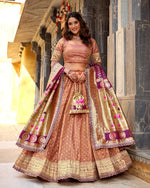 Womenline Peach Color Shimmer Organza Silk Lehenga Choli
