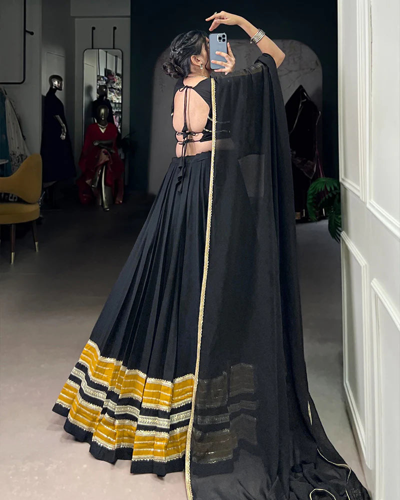 Womenline Black and Mustard Navratri Flared Navratri Lehenga Choli Set