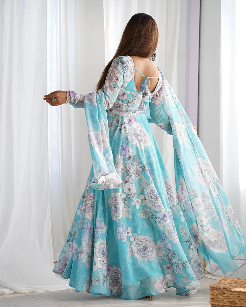 Womenline Sky Blue Color Georgette Floral Printed Gown