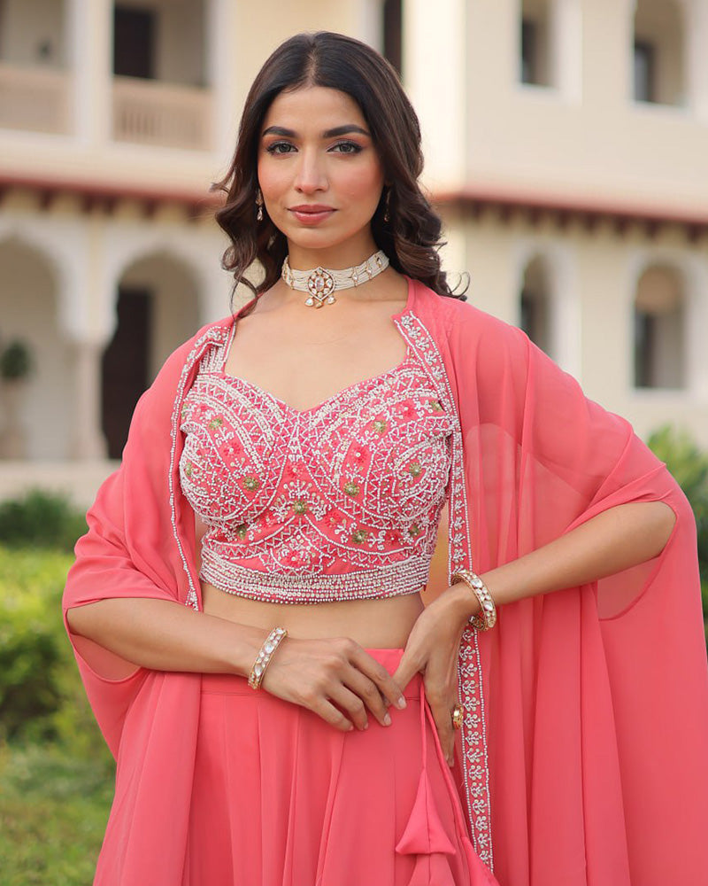 Womenline Peach Color Faux Georgette Embroidered Lehenga Choli