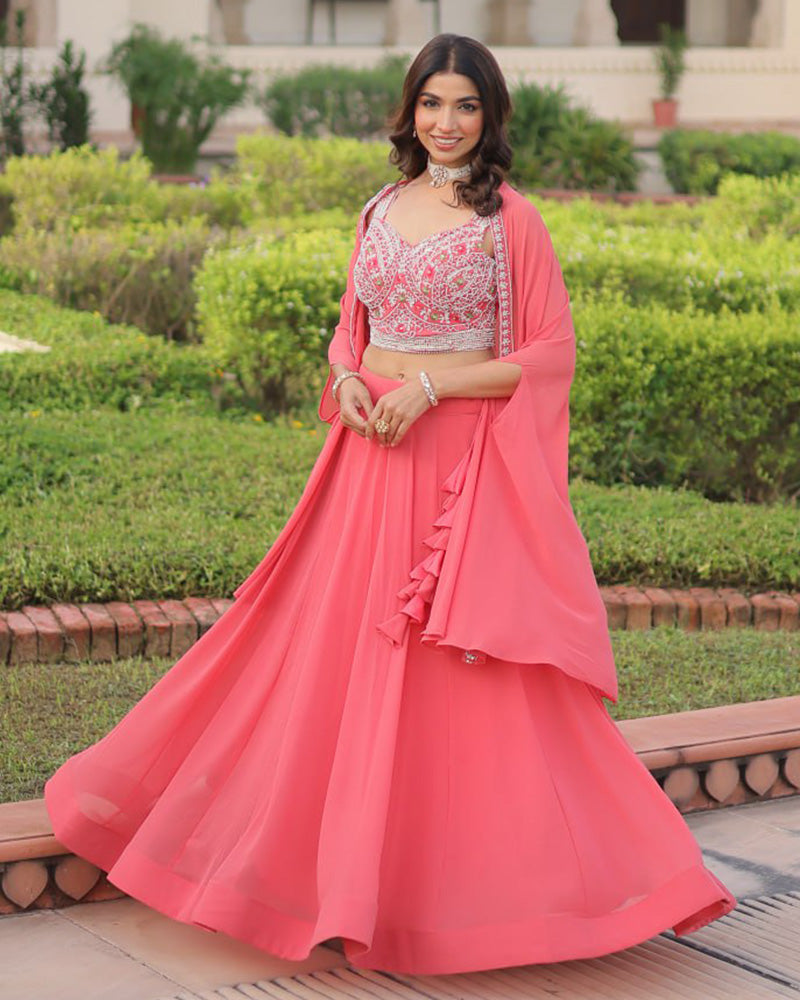 Womenline Peach Color Faux Georgette Embroidered Lehenga Choli