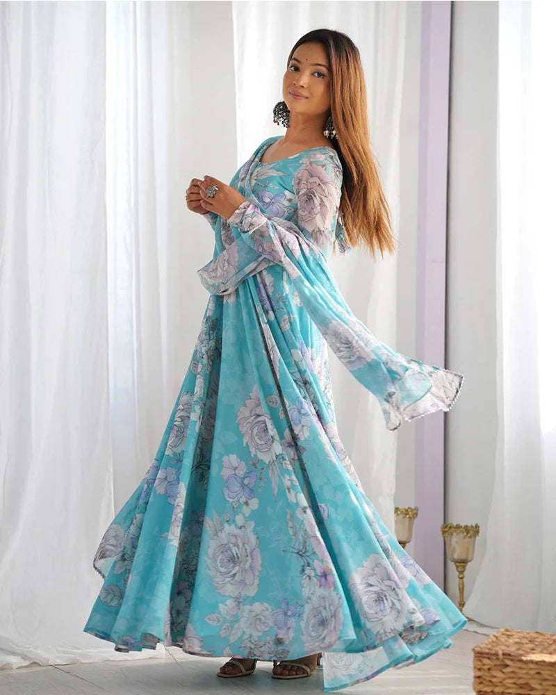 Womenline Sky Blue Color Georgette Floral Printed Gown