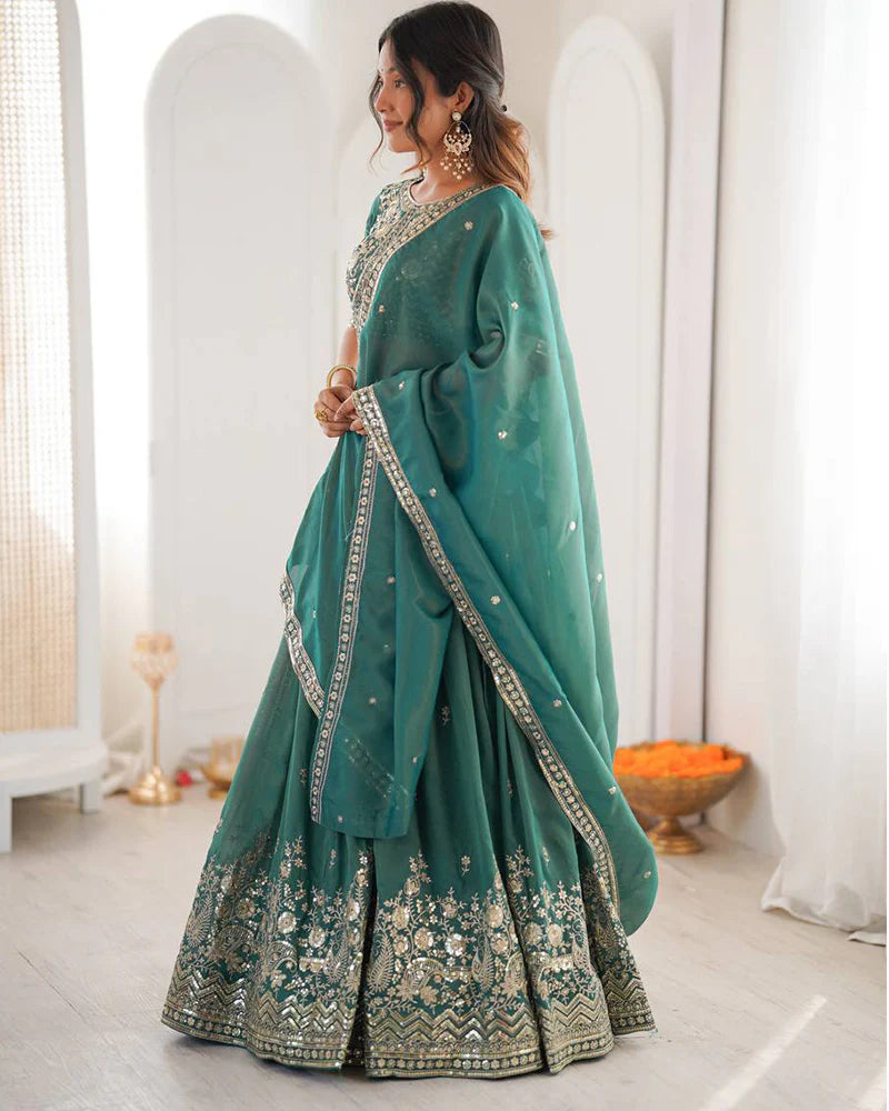 Womenline Teal Green Color Shimmer Silk Lehenga Choli
