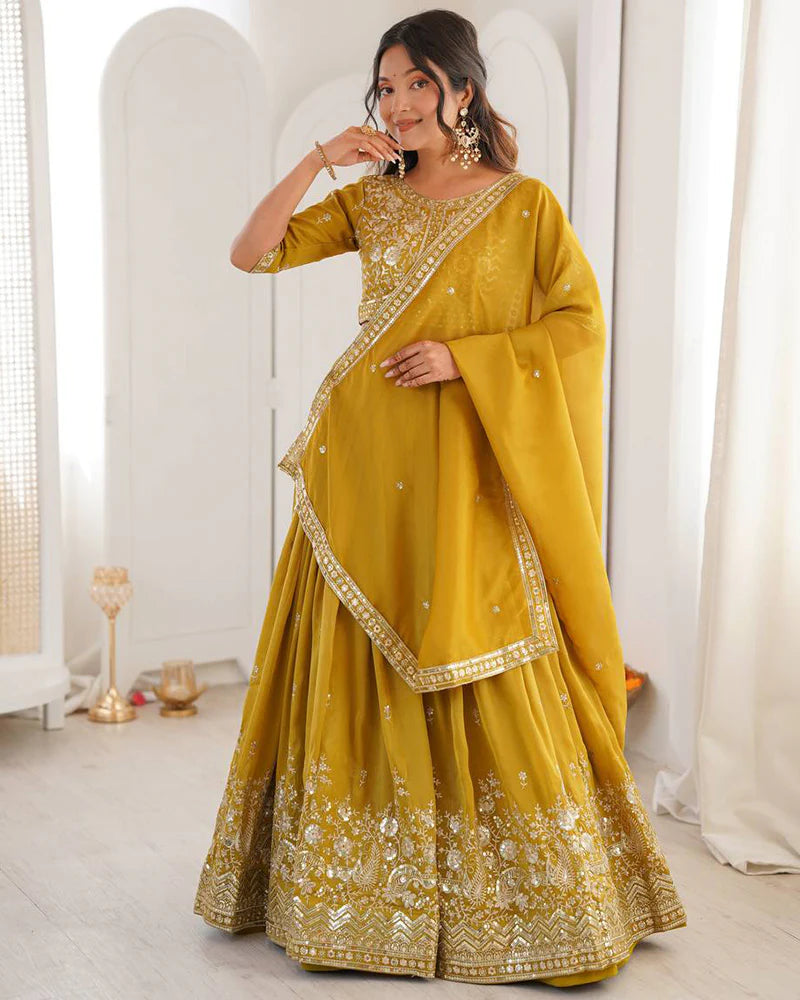 Womenline Yellow Color Shimmer Silk Lehenga Choli