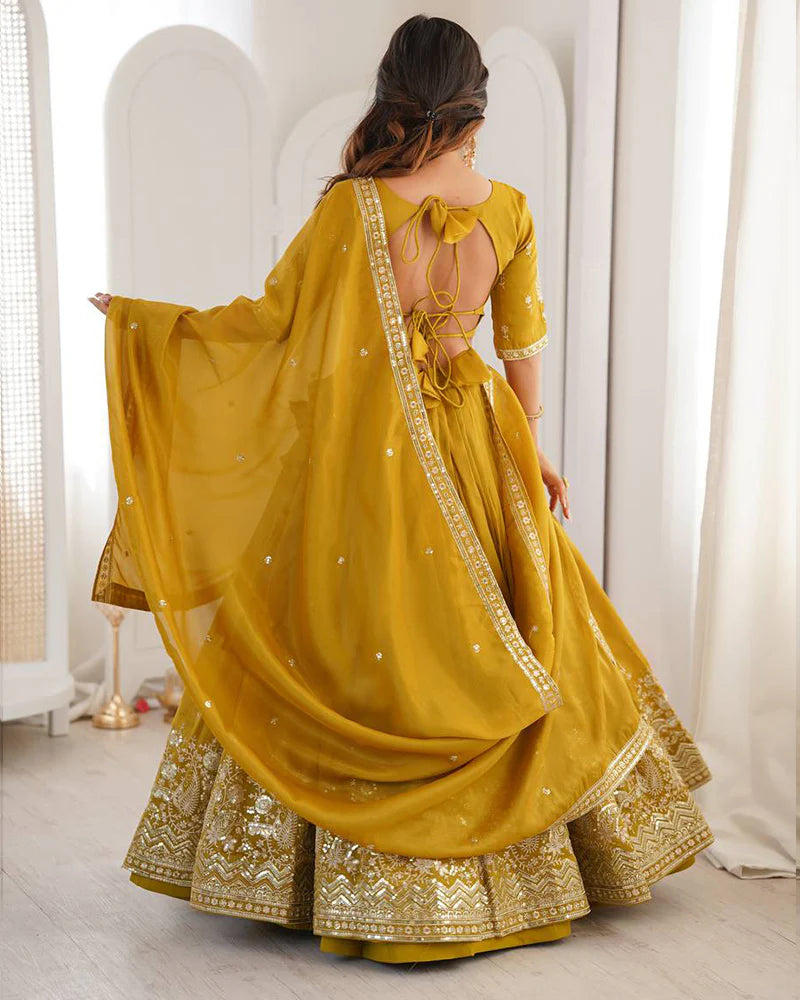 Womenline Yellow Color Shimmer Silk Lehenga Choli