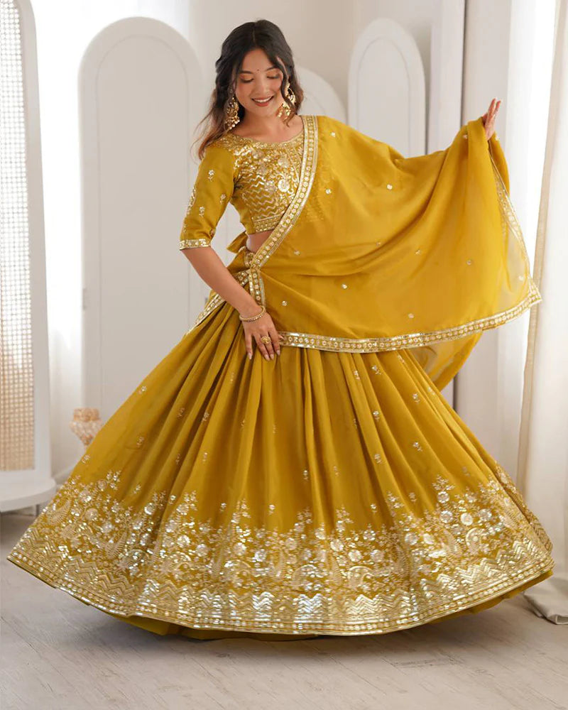 Womenline Yellow Color Shimmer Silk Lehenga Choli