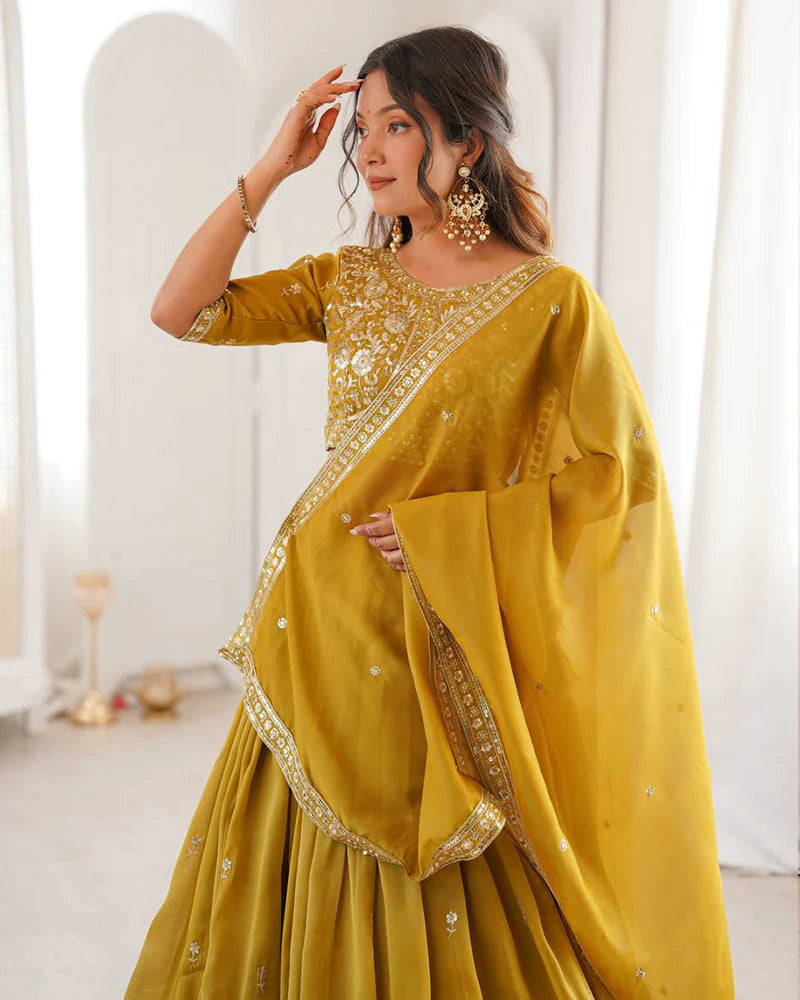 Womenline Yellow Color Shimmer Silk Lehenga Choli