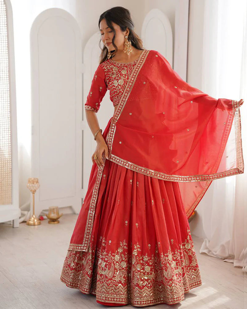Womenline Orange Color Shimmer Silk Lehenga Choli