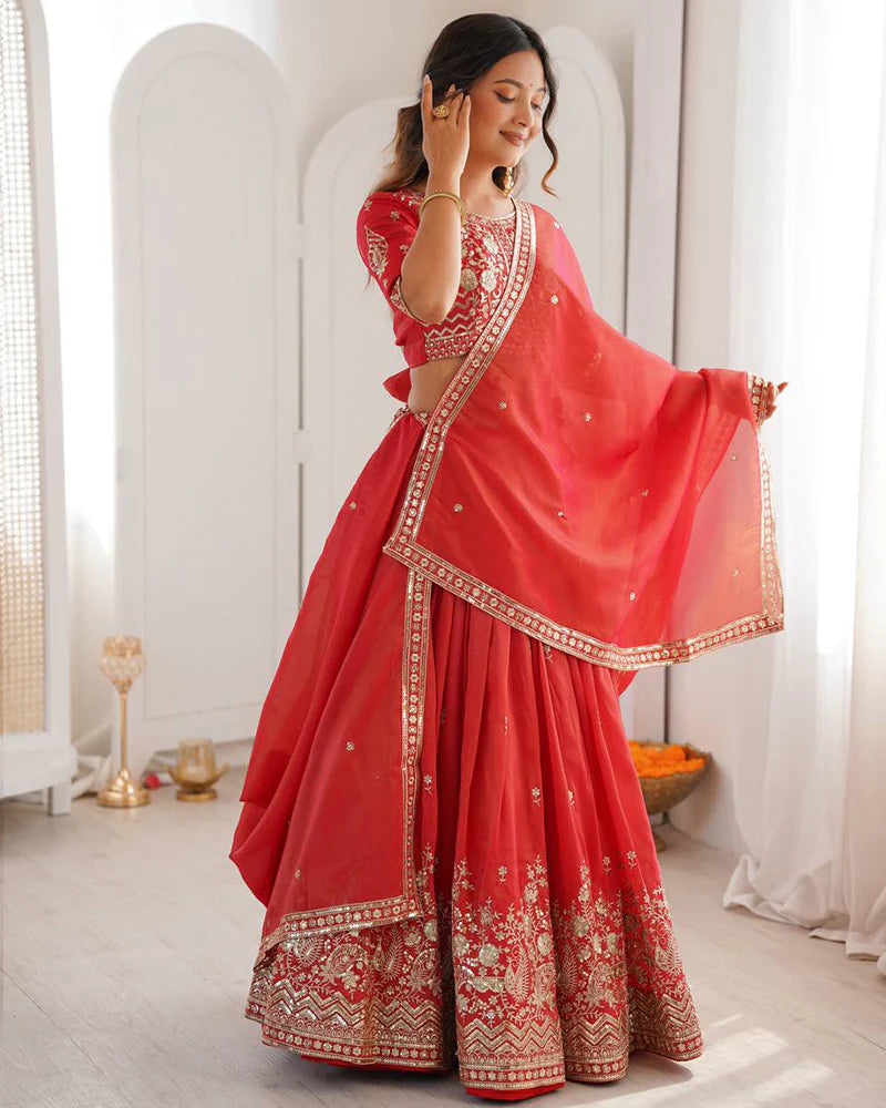Womenline Orange Color Shimmer Silk Lehenga Choli