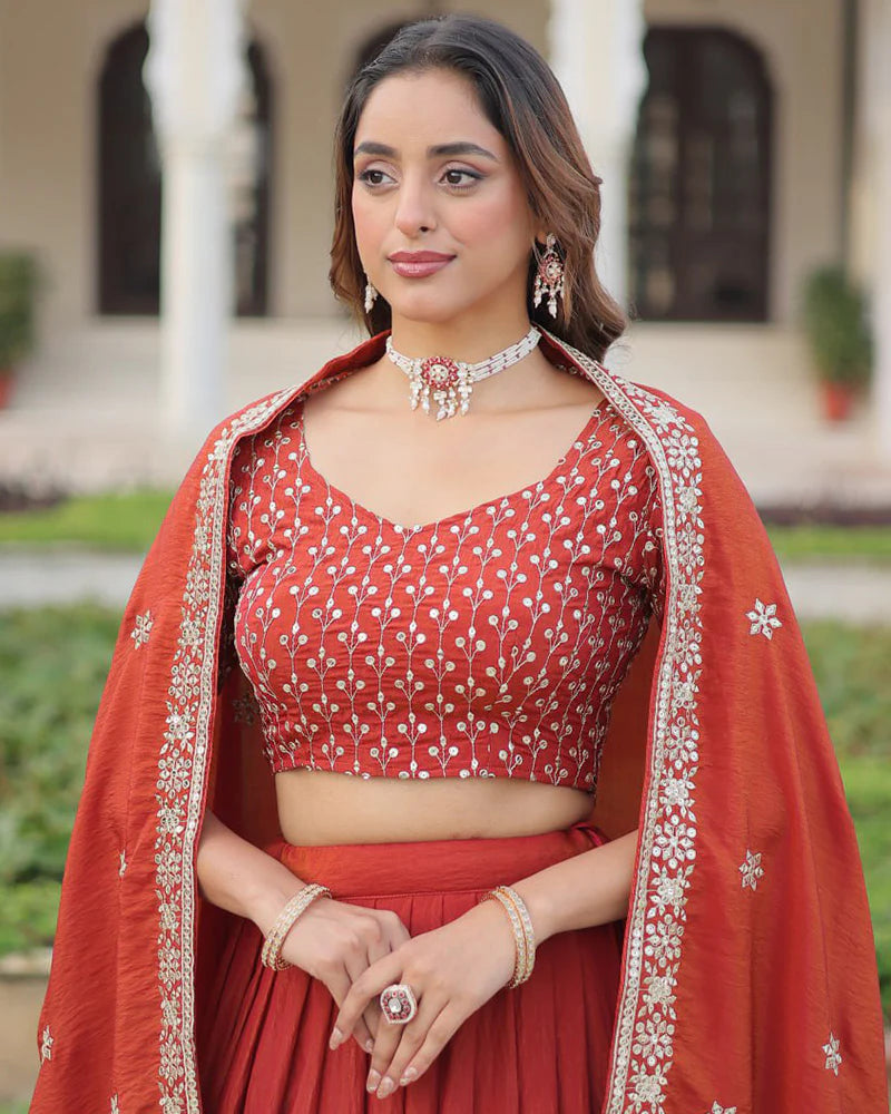 Womenline Rust Orange Color Vichitra Silk Embroidered Lehenga Choli