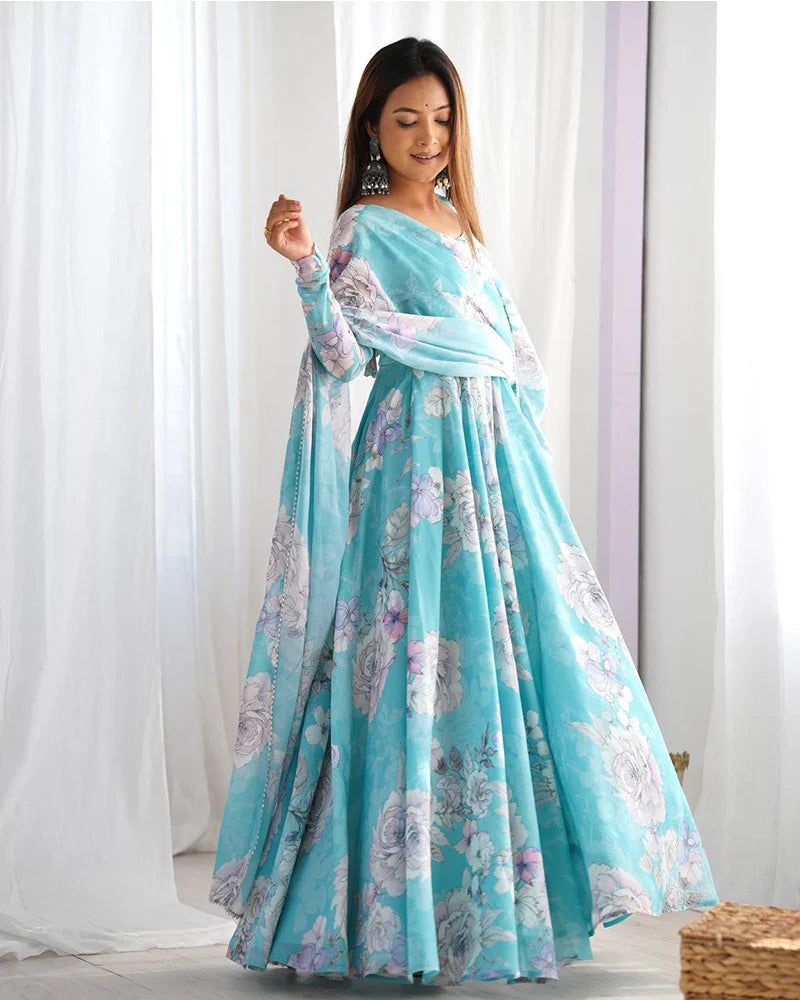 Womenline Sky Blue Color Georgette Floral Printed Gown