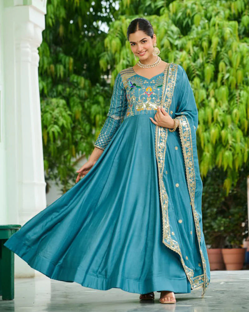 Womenline Teal Blue Color Vichitra Silk Sequence Embroidered Gown